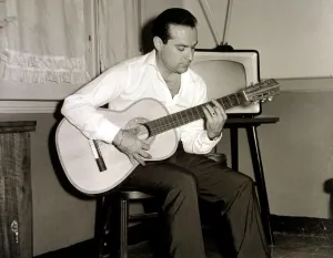 Ramon Calduch, Spanish singer playing guitar at home, 1967 Ramon Calduch, Spanish singer playing guitar at home, 1967