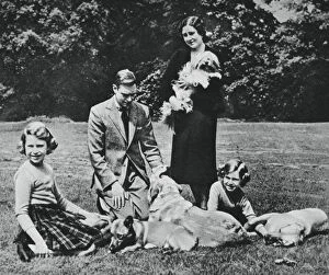 Queen Of Britain Windsor Gallery: Royal family as a happy group of dog lovers, 1937.Artist: Michael Chance