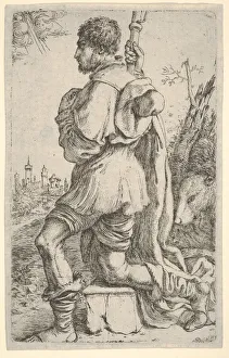 Saint Roch, kneeling on a stone, seen from the side with his dog behind him and a towns Saint Roch, kneeling on a stone, seen from the side with his dog behind him and a towns