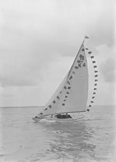 Lee Bow Gallery: Saling yacht Asphodel (K5) with prize flags, 1922. Creator: Kirk & Sons of Cowes