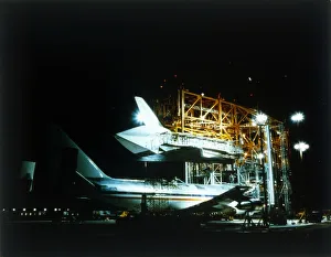Space Shuttle and 747 carrier plane in Mate-Demate Device. Creator: NASA Space Shuttle and 747 carrier plane in Mate-Demate Device. Creator: NASA