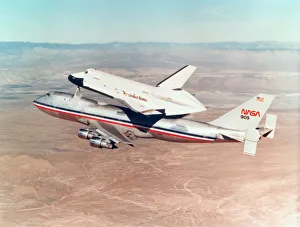 Space Shuttle Orbiter mounted on top of a Boeing 747 carrier aircraft, 1977 Space Shuttle Orbiter mounted on top of a Boeing 747 carrier aircraft, 1977