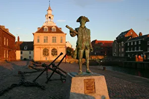 Statue of Captain Vancouver at dusk on the Purfleet Quay, Kings Lynn, Norfolk Statue of Captain Vancouver at dusk on the Purfleet Quay, Kings Lynn, Norfolk