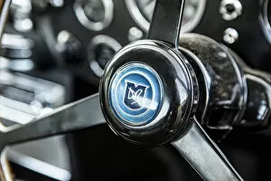 Steering wheel boss of a 1965 Aston Martin DB5. Creator: Unknown