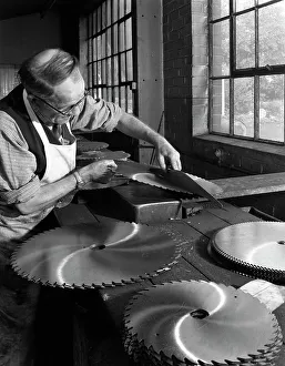 Tensioning circular saws at Slack Sellers & Co Ltd, Sheffield, 1963. Artist Tensioning circular saws at Slack Sellers & Co Ltd, Sheffield, 1963. Artist