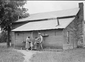 Back Yard Collection: Tobacco sharecropper and his family at the back... Person County, North Carolina, 1939