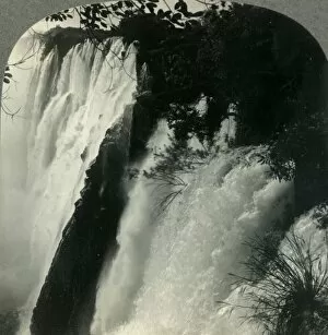 Cape Floral Region Protected Areas Gallery: Victoria Falls Making a 343-Foot Plunge, Rhodesia, South Africa, c1930s. Creator: Unknown