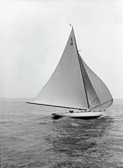 Sailing Boat Gallery: Wamba II running downwind under spinnaker, 1914. Creator: Kirk & Sons of Cowes