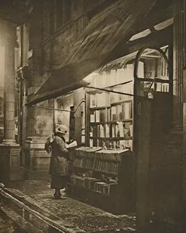 Wintry Collection: Wet Winter Evening and a Book Lover in Bloomsbury, c1935. Creator: Fincham
