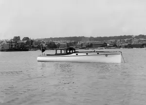Wolseley motor launch at anchor, 1914. Creator: Kirk & Sons of Cowes Wolseley motor launch at anchor, 1914. Creator: Kirk & Sons of Cowes