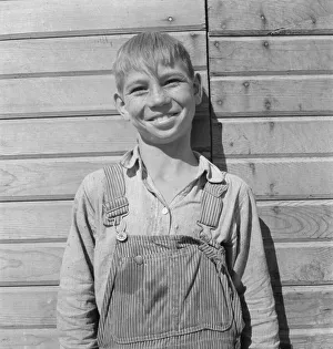 Dorothea Lange Print: Younger Cleaver Boy on New Farm, 1939
