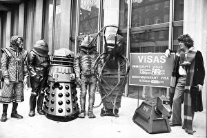 Black And White Gallery: Actor Tom Baker as Dr Who, with his robot dog K-9, and assorted friends at the US Embassy 1978