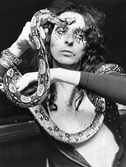Heathrow Airport Collection: Alice Cooper with his snake Katrina
