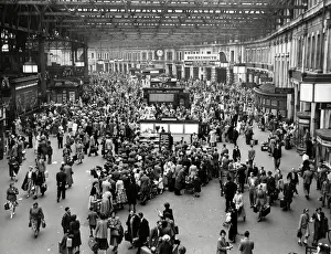 Crowds of commuters at Waterloo train station, 1953 Crowds of commuters at Waterloo train station, 1953