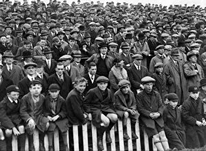 Crowds watching football match between Northampton Town and Norwich City