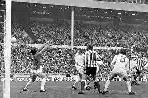 Footballers Collection: Ian Porterfield's (right) shot flies over Leeds goalkeeper David Harvey to score the goal that