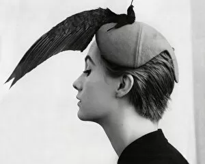 Images Dated 28th April 2011: Model wearing hat with bird wing design