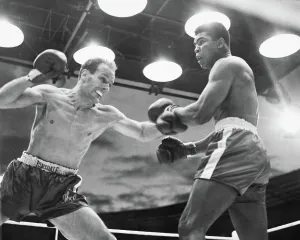 Muhammad Ali v Henry Cooper in a non-title fight at Wembley Stadium in 1963 Muhammad Ali v Henry Cooper in a non-title fight at Wembley Stadium in 1963