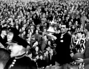 Newcastle United manager Joe Harvey with the FA Cup parading through the streets of Newcastle United manager Joe Harvey with the FA Cup parading through the streets of
