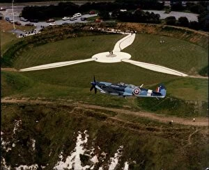 Battle of Britain Gallery: RAF Spitfire flies over the Battle of Britain Museum and Memorial at Capel-Le-Ferne in Dover, Kent