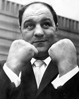 Rocky Marciano undefeated former heavyweight champion of the world, arriving in London Rocky Marciano undefeated former heavyweight champion of the world, arriving in London
