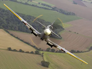 Air to air image of a Spitfire, taken over RAF Coningsby Air to air image of a Spitfire, taken over RAF Coningsby