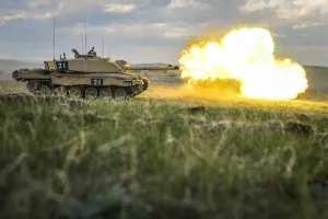 A Challenger 2 MBT firing as part of the Royal Welsh Battle Group during Exercise Prairie Lightning A Challenger 2 MBT firing as part of the Royal Welsh Battle Group during Exercise Prairie Lightning