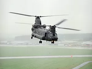 Images Dated 17th May 2001: A Chinook of 27 Sqn based at RAF Odiham photographed flying low over an airfield in Scotland