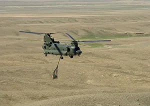Chinook from 27 Squadron RAF Carrying Stores Over Afghanistan Chinook from 27 Squadron RAF Carrying Stores Over Afghanistan