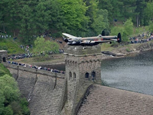 Images Dated 16th May 2008: Dambuster Lancaster Soars Again Over the Derwent Valley Dam