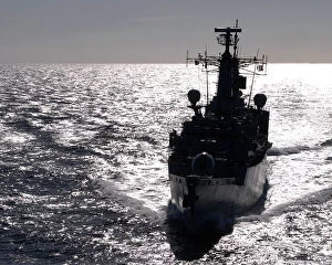 Frigate Gallery: HMS Campbeltown silhouetted at sea enroute to Gibraltar in 2007