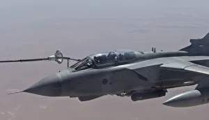 An RAF Tornado GR4 takes on fuel from a Voyager tanker aircraft during an armed reconnaissance An RAF Tornado GR4 takes on fuel from a Voyager tanker aircraft during an armed reconnaissance