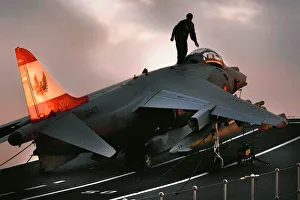 A Royal Air Force Harrier Jump Jet Waits to Depart from HMS Ark Royal A Royal Air Force Harrier Jump Jet Waits to Depart from HMS Ark Royal