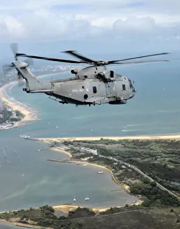 ROYAL NAVY Merlin Helicopter Flying Over South Coast of England ROYAL NAVY Merlin Helicopter Flying Over South Coast of England