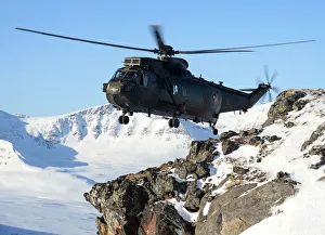 Royal Navy Seaking Mk4 Helicopter Over Northern Norway Royal Navy Seaking Mk4 Helicopter Over Northern Norway