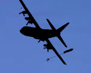 Submarine Parachute Assistance Group Member Jumps from RAF Hercules Aircraft Submarine Parachute Assistance Group Member Jumps from RAF Hercules Aircraft