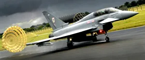 A Typhoon F2 fighter jet from 29 Squadron Royal Air Force deploys its braking parachute A Typhoon F2 fighter jet from 29 Squadron Royal Air Force deploys its braking parachute