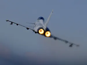 A Typhoon F2 fighter jet pilot applies the throttle as the aircraft pulls away A Typhoon F2 fighter jet pilot applies the throttle as the aircraft pulls away