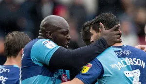 Adebayo Akinfenwa and Joe Jacobson Adebayo Akinfenwa and Joe Jacobson