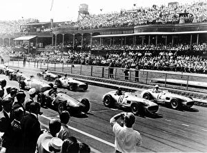 Images Dated 28th October 2009: 1955 British Grand Prix: Stirling Moss, Juan Manuel Fangio and Jean Behra lead Karl Kling