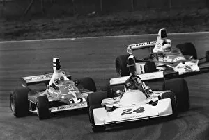 1975 Dutch Grand Prix: James Hunt, 1st position, leads Niki Lauda, 2nd position and Jochen Mass, retired, action