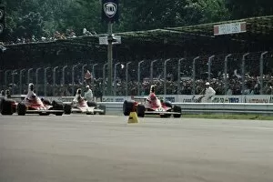 Images Dated 8th June 2011: 1975 Italian Grand Prix - Start: Niki Lauda, 3rd position, leads Clay Regazzoni