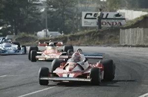 1976 Canadian Grand Prix: Niki Lauda, 8th position leads Jochen Mass, 5th position and Jacques Lafitte, retired, action
