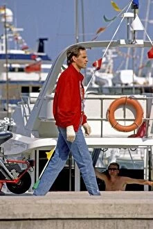 Images Dated 5th April 2007: 1989 Monaco Grand Prix. Monte Carlo, Monaco. 4-7 May 1989. Gerhard Berger has to walks past