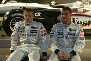 Images Dated 19th January 2002: 2002 West McLaren Mercedes Launch Kimi Raikkonen and David Coulthard with the new MP4-17 Circuit