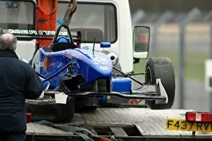 Images Dated 14th March 2003: British Formula Three Testing: The damaged remains of the Meritus Racing F3 car of Saif Hassan