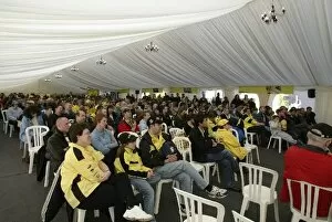 Images Dated 28th October 2002: Club Jordan Factory Open Day: Jordan fans listen to a live telephone interview with the drivers in