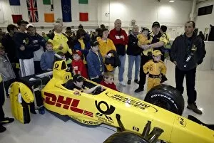 Images Dated 28th October 2002: Club Jordan Factory Open Day: A young fan has a go in an F1 simulator