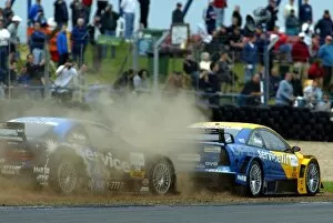 Images Dated 19th May 2002: DTM Championship: Stefan Mucke AMG Mercedes, left, tangles with Yves Olivier Opel Astra V8 Coupe