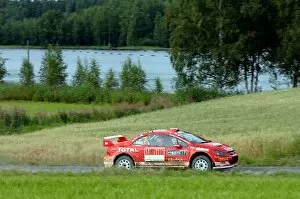 Images Dated 6th August 2005: FIA World Rally Championship: Rally leader Marcus Gronholm, Peugeot 307 WRC, on stage 16